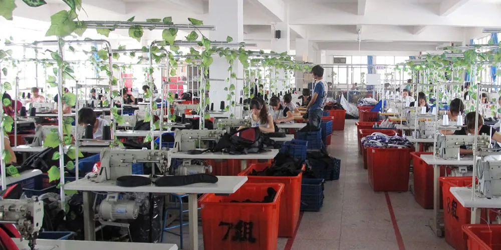 Wide view of sewing stations inside the Benshine workshop